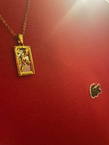 Customer photo review of The Lovers - Tarot card Dainty  18k Necklace with Enamel