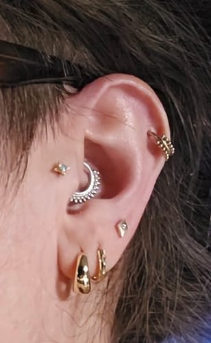 Customer photo review of 14k Mini Textured Hoops