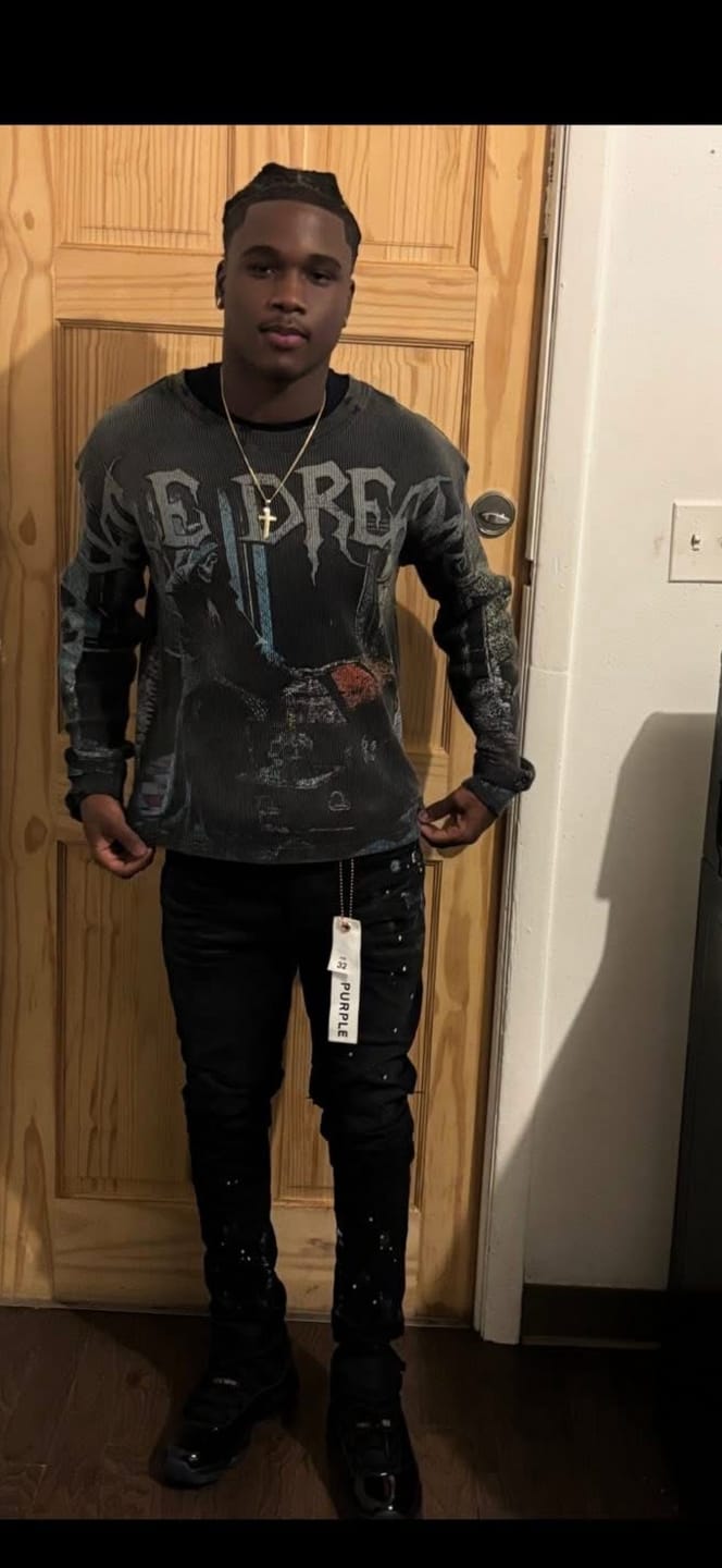 Customer photo review of Purple Brand Black Resin Knee Slit Jean