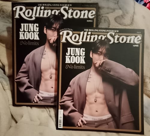 Customer's two copies of the Rolling Stone Korea magazine with the Jung Kook cover, laid out on a blanket.