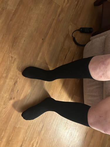 Customer wearing the black Performance Eucalyptus Compression Socks, viewed from above.