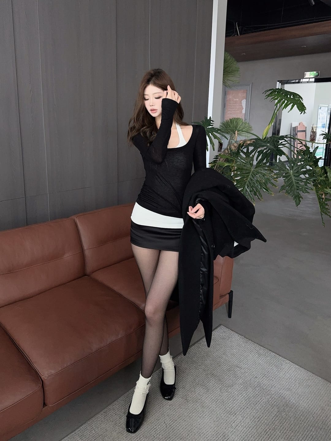 Customer photo review of ROVENTE Layered Long Sleeve Top and Fitted Mini Skirt Two-Piece Set