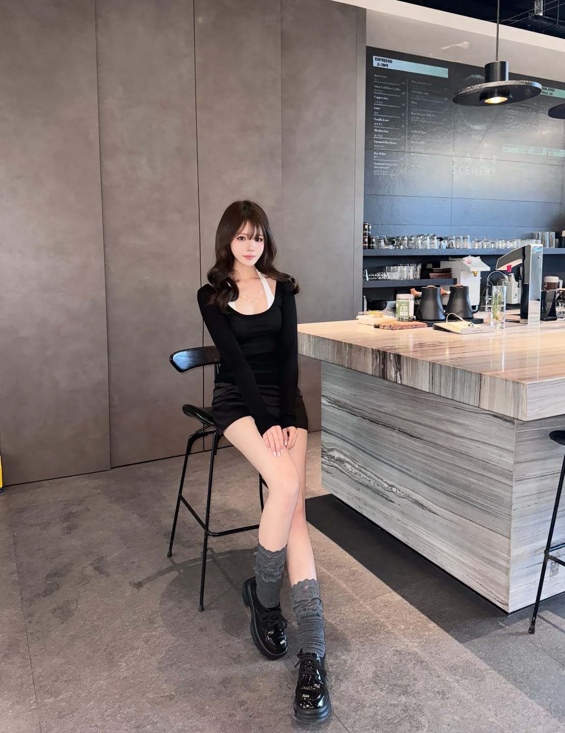 Customer photo review of ROVENTE Layered Long Sleeve Top and Fitted Mini Skirt Two-Piece Set