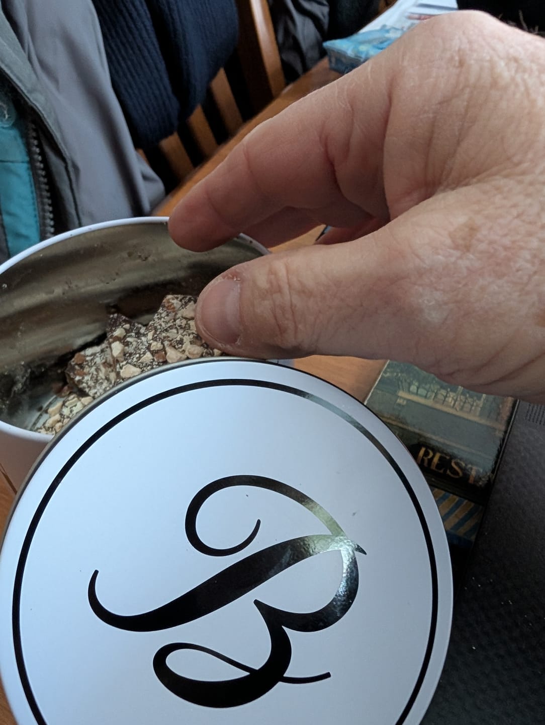 Customer photo review of 1/2 LB Tin Almond Toffee Bites