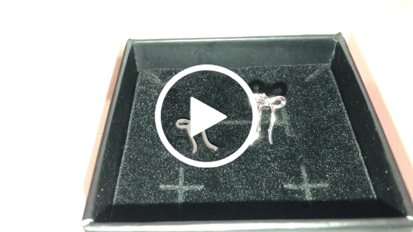 Customer video review of Lola 18k White Gold Plated Ribbon/Bow Drop Earrings