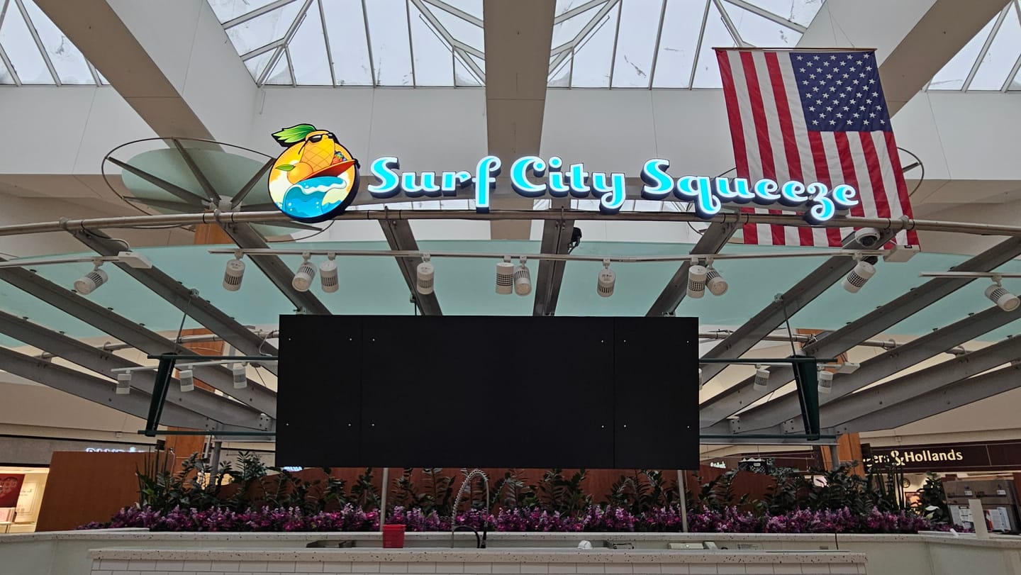 Customer photo review of Custom 3D Frontlit Channel Letter Sign for Surf City Squeeze