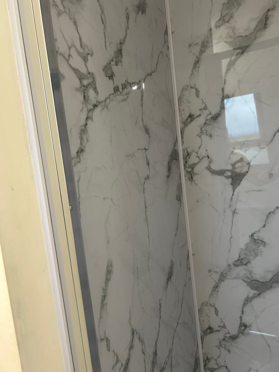 Customer photo review of Premium White Calacatta Gloss Shower Wall Panel – 1M x 2.4M