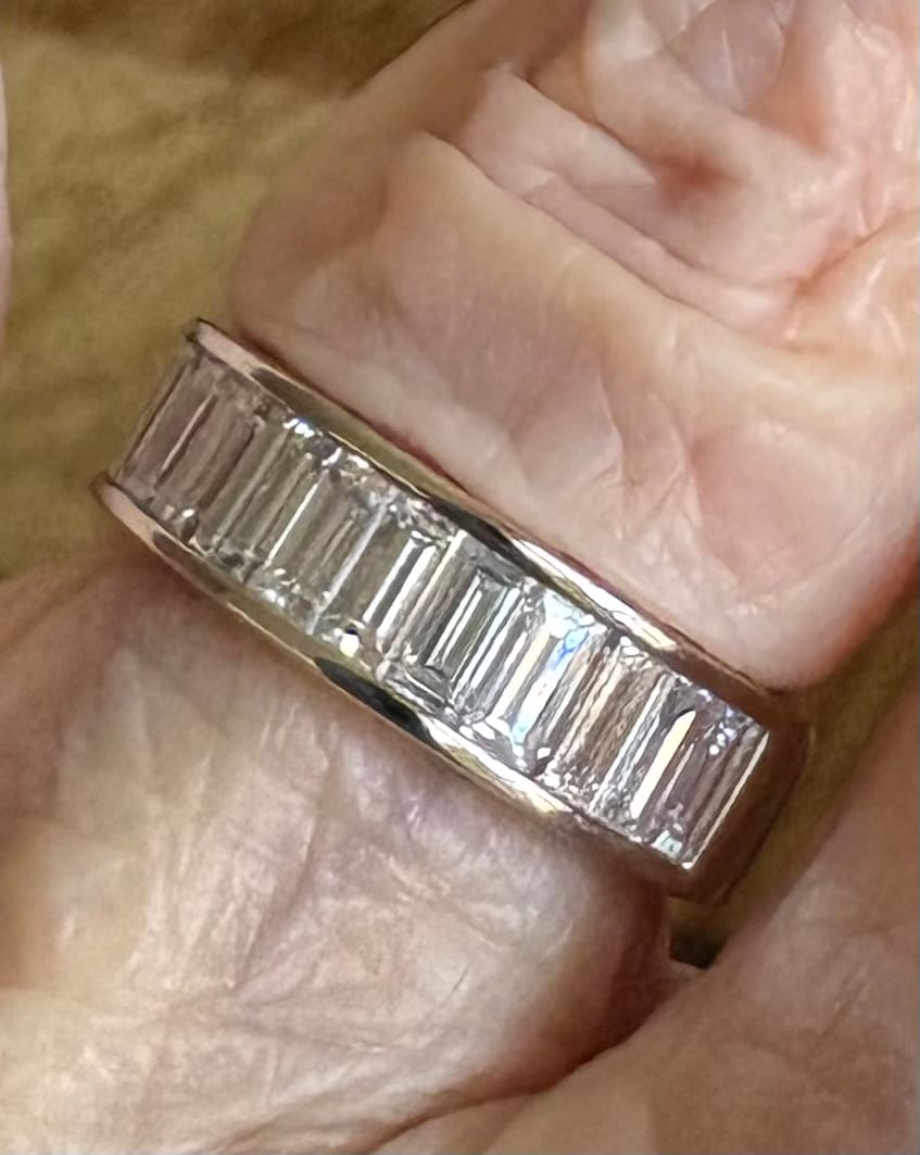 Customer photo review of Channel Set Moissanite Half Eternity Wedding Band Ring In Sterling Silver