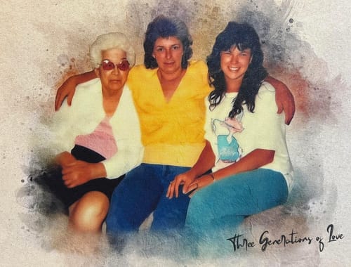 Customer's personalized painting, restored from an old photo, showing three generations of women sitting closely together.