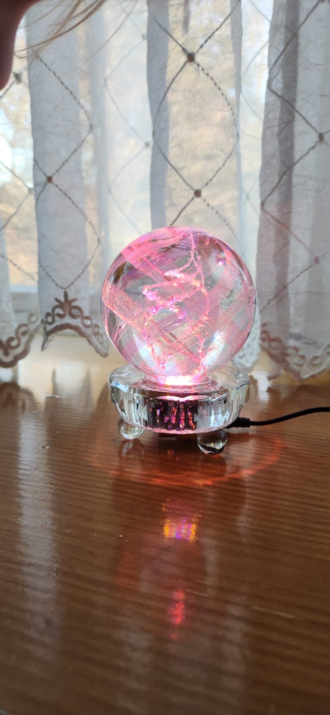 Customer photo review of Illuminated Dichroic Rainbow Orb with Cremains