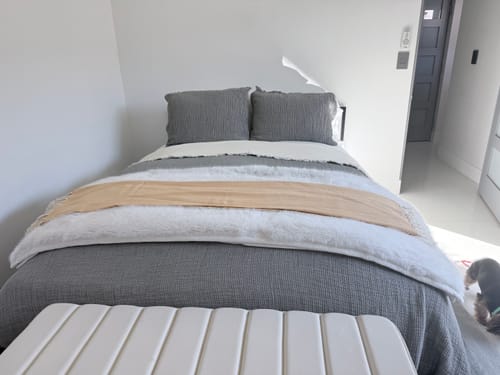 Customer photo review of Hazea Muslin Blanket - Soft Pebble