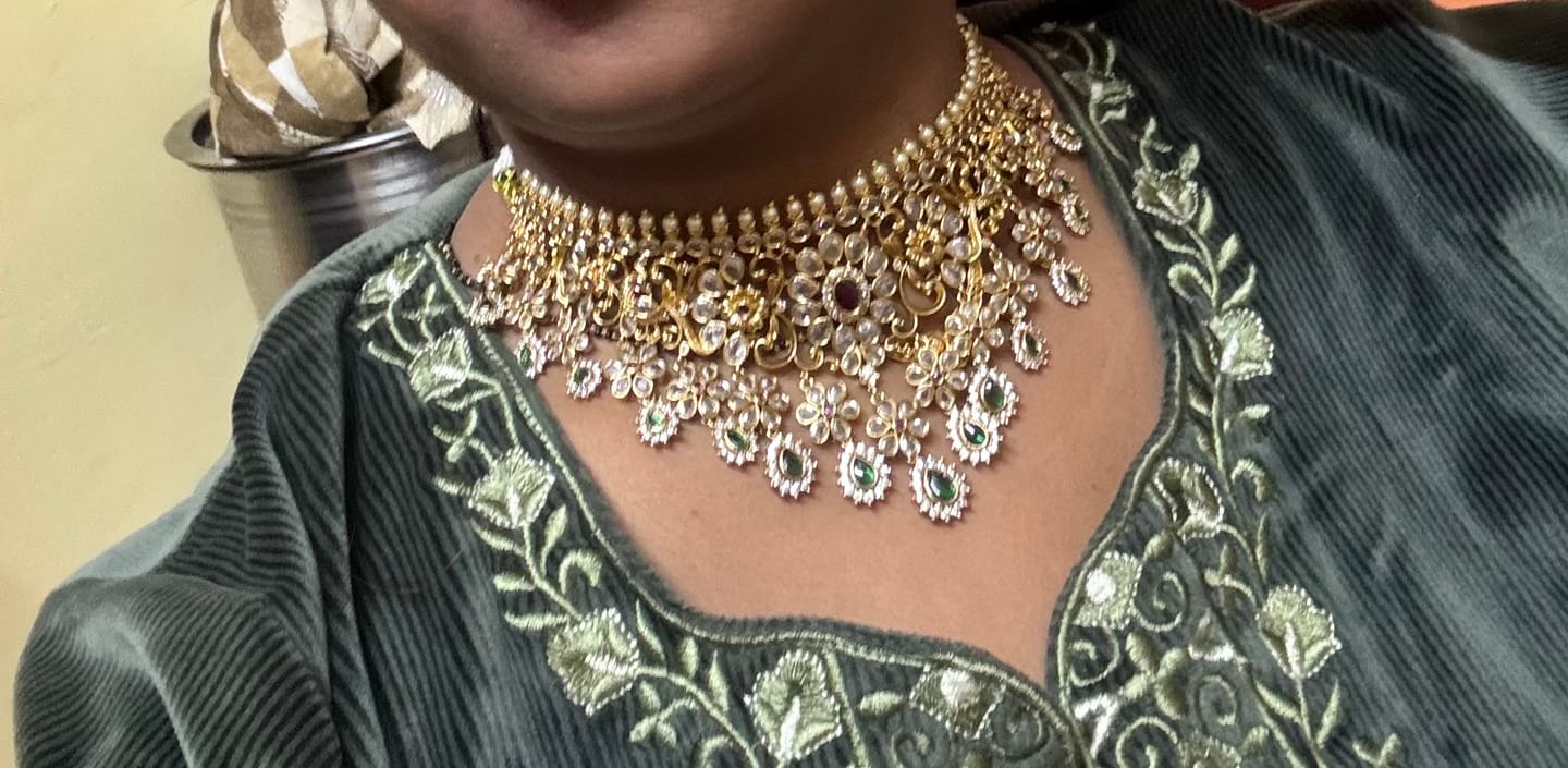 Customer photo review of Polki,ruby and green stones studded flower and leaf tukdi tassel drops choker set
