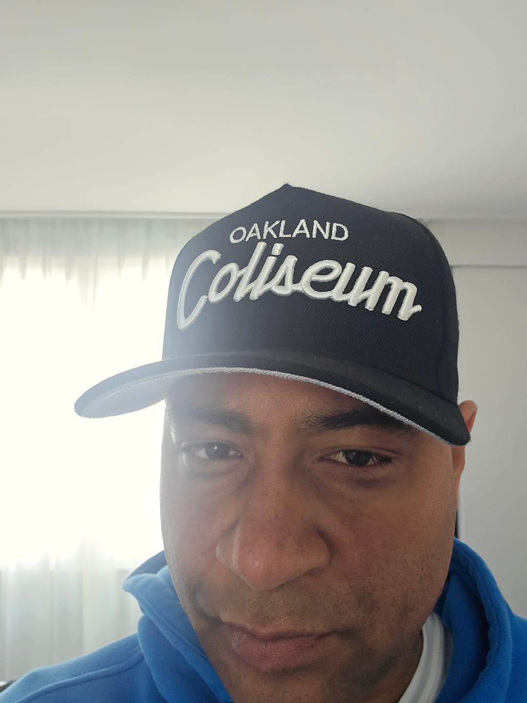 Customer photo review of Classic Coliseum Font Snap Back Hats