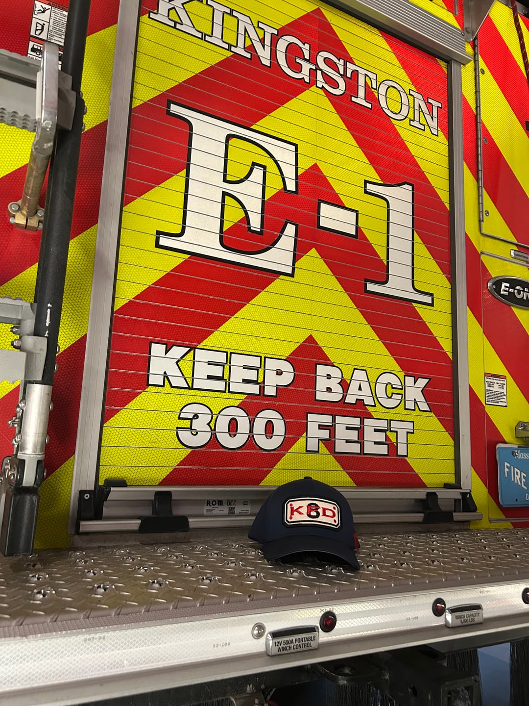 Customer photo review of FLEXFIT HOSE HAT WITH CUSTOM BACK OF HAT