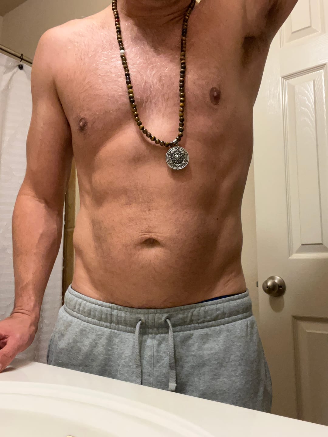 Customer photo review of 108 Natural Tiger Eye & 7 Chakra Gemstone Mala Bead Necklace
