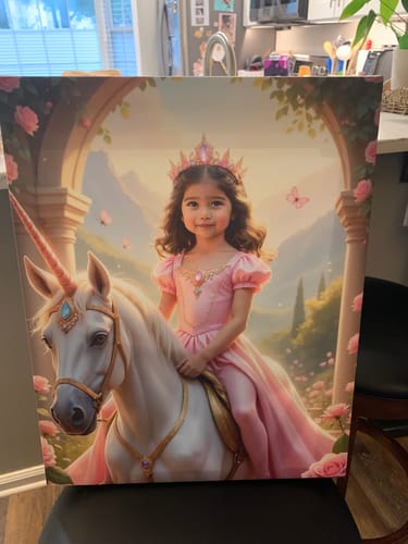 Reviewer's detailed canvas print of 'The Rose Blossom Unicorn Princess' showing a child in a pink dress riding a white unicorn.