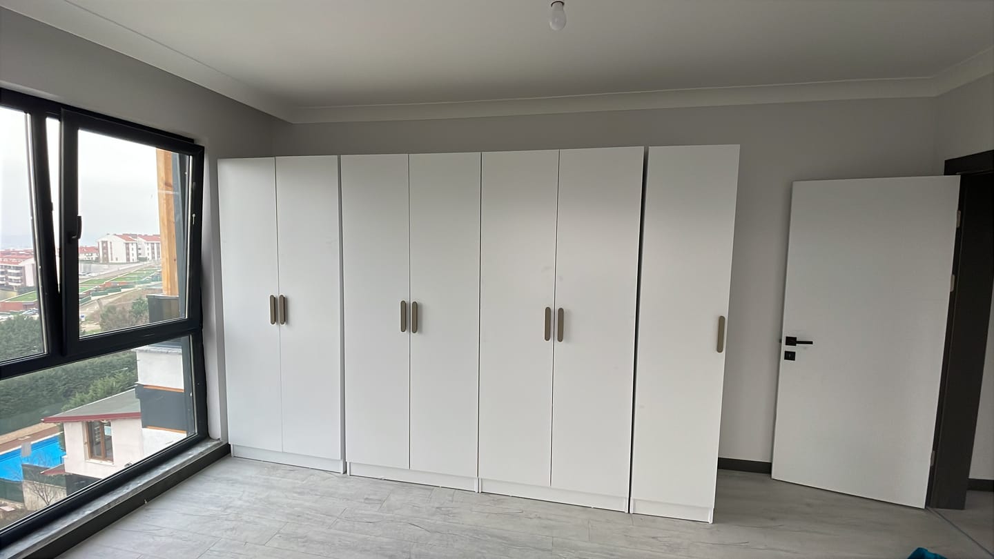 Customer photo review of Rani BA153 Geniş Gardırop Elbise Dolabı 7 Kapaklı 12 Raflı 3 Askılı Modüler Dolap Beyaz