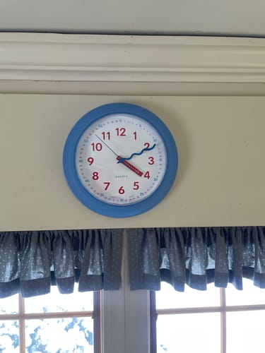 Customer photo review of Modern Plastic Yellow Wall Clock