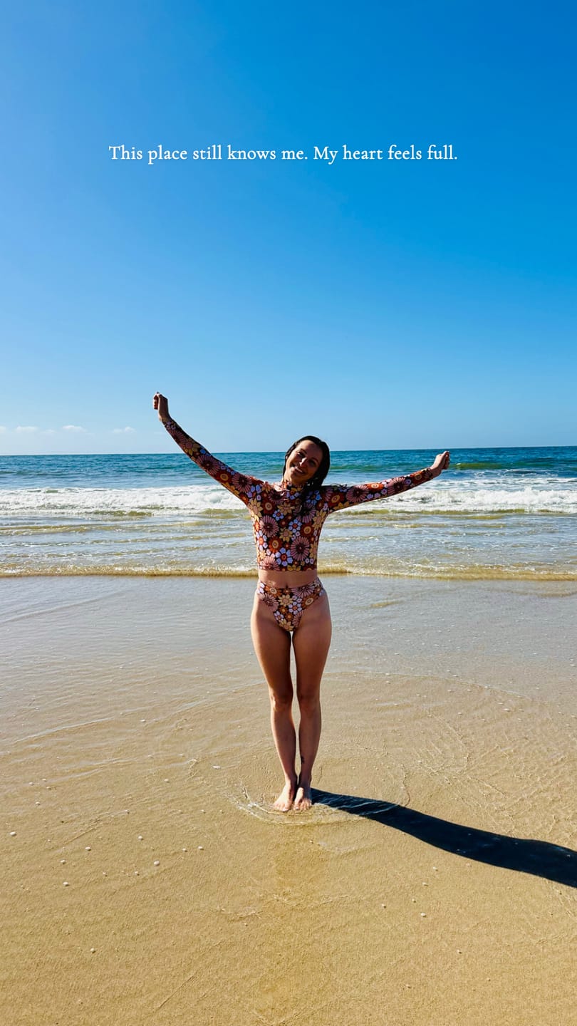 Customer photo review of Flower Power Long Sleeve Surf Top