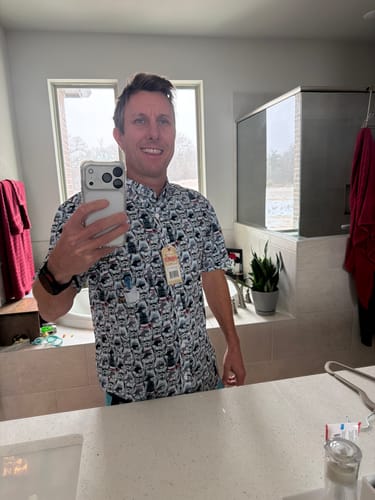 Reviewer trying on the new Star Wars™ 'Thrawn's Pawns' shirt in a mirror selfie.