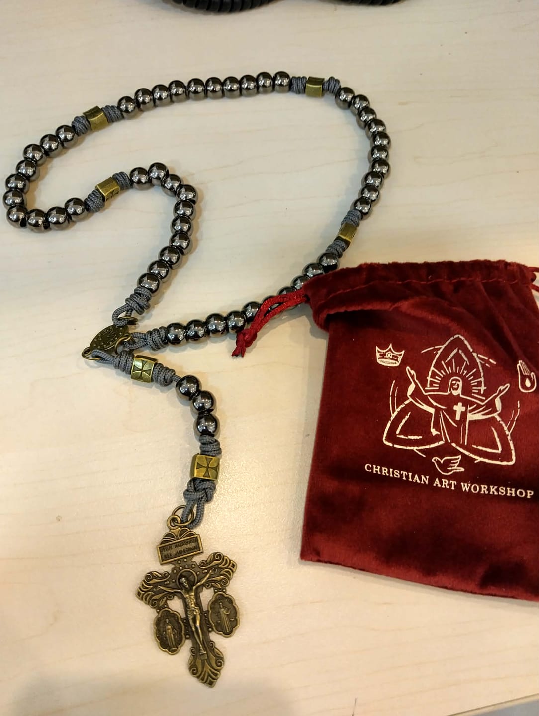 Customer photo review of FREE Today: Miraculous Medal & Crucifix of 8 mm Round Silver Black Gallstone Nylon Cord Rosary