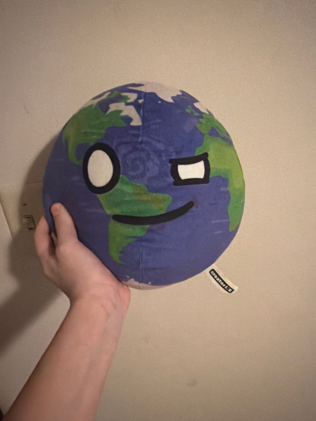 Customer photo review of The SolarBalls Earth Plush