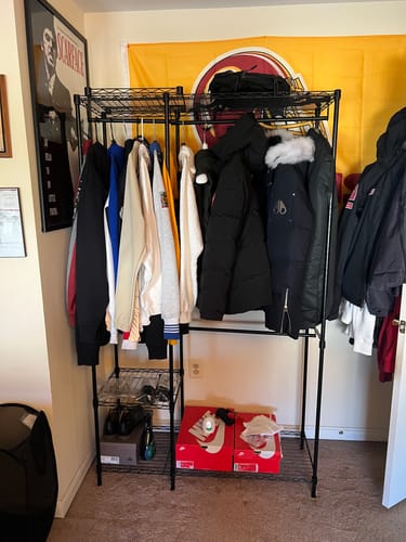 Customer photo review of Raybee Heavy Duty Portable Closet, Wire Garment Rack on wheels, Adjustable Hanging Clothes Rack, For Bedroom