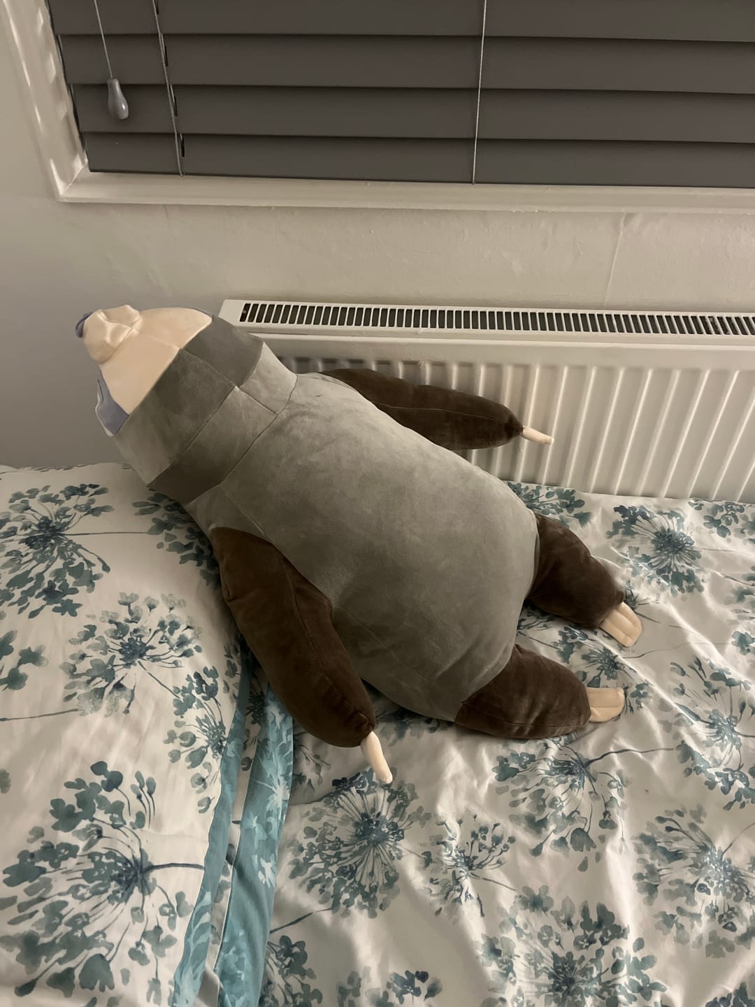Customer photo review of Sleeping Sloth Plushie