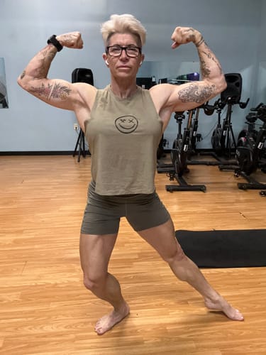 Customer photo review of Salty Savage Ladies "the worst." Flowy Racerback Crop Tank | Mix Up