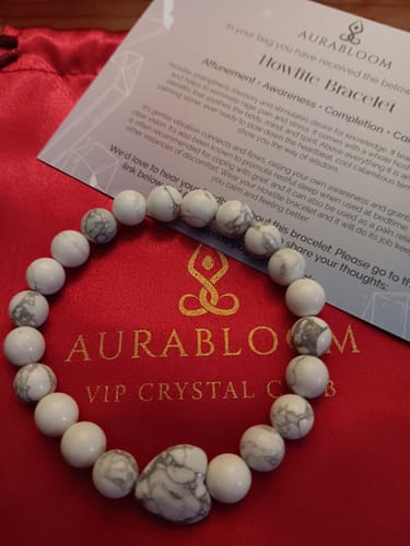 Customer's Howlite bracelet from the VIP Crystal Club, featuring round beads and a large, heart-shaped stone.