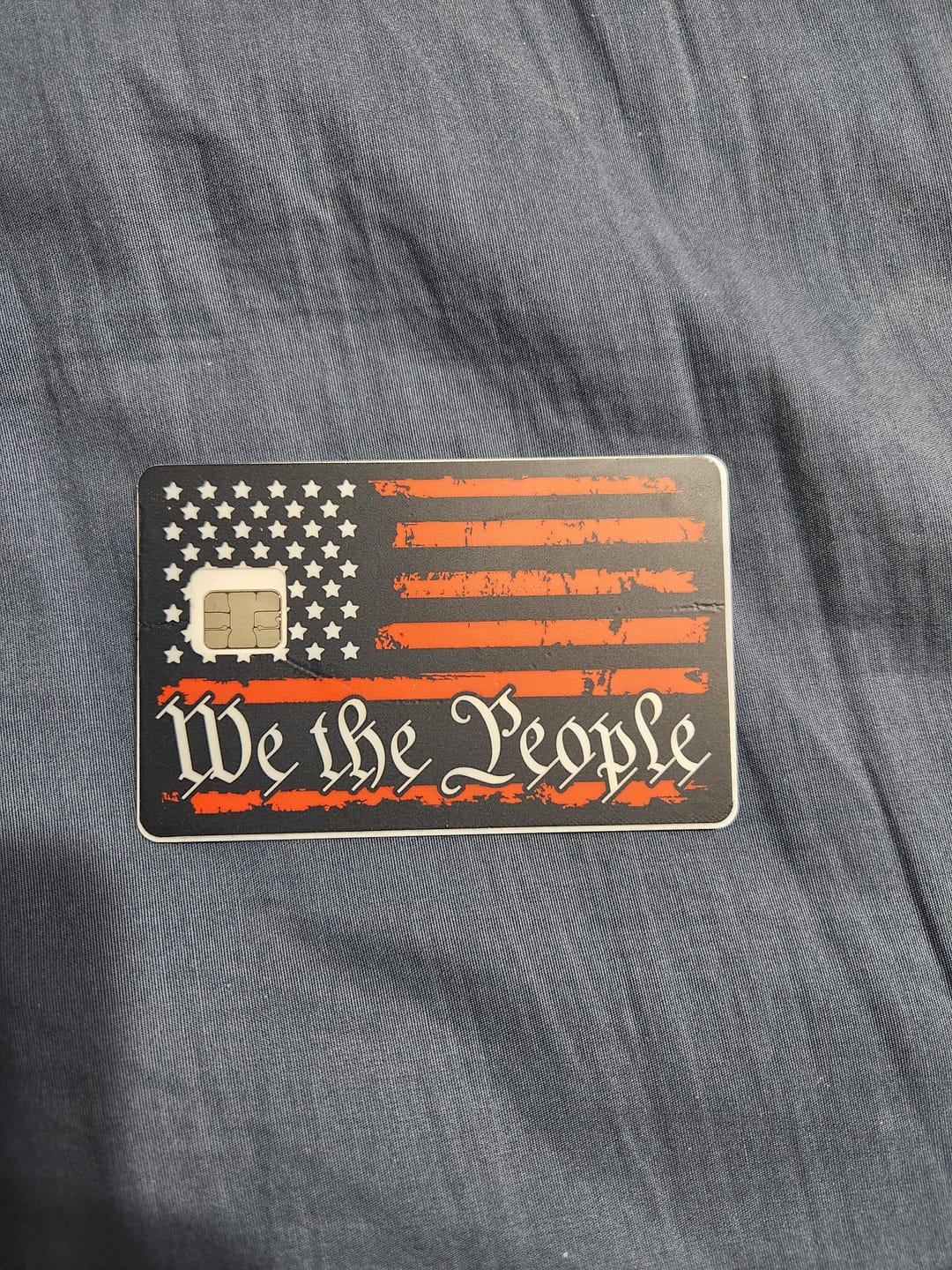 Customer photo review of We The People Flag Credit Card Skin Decal