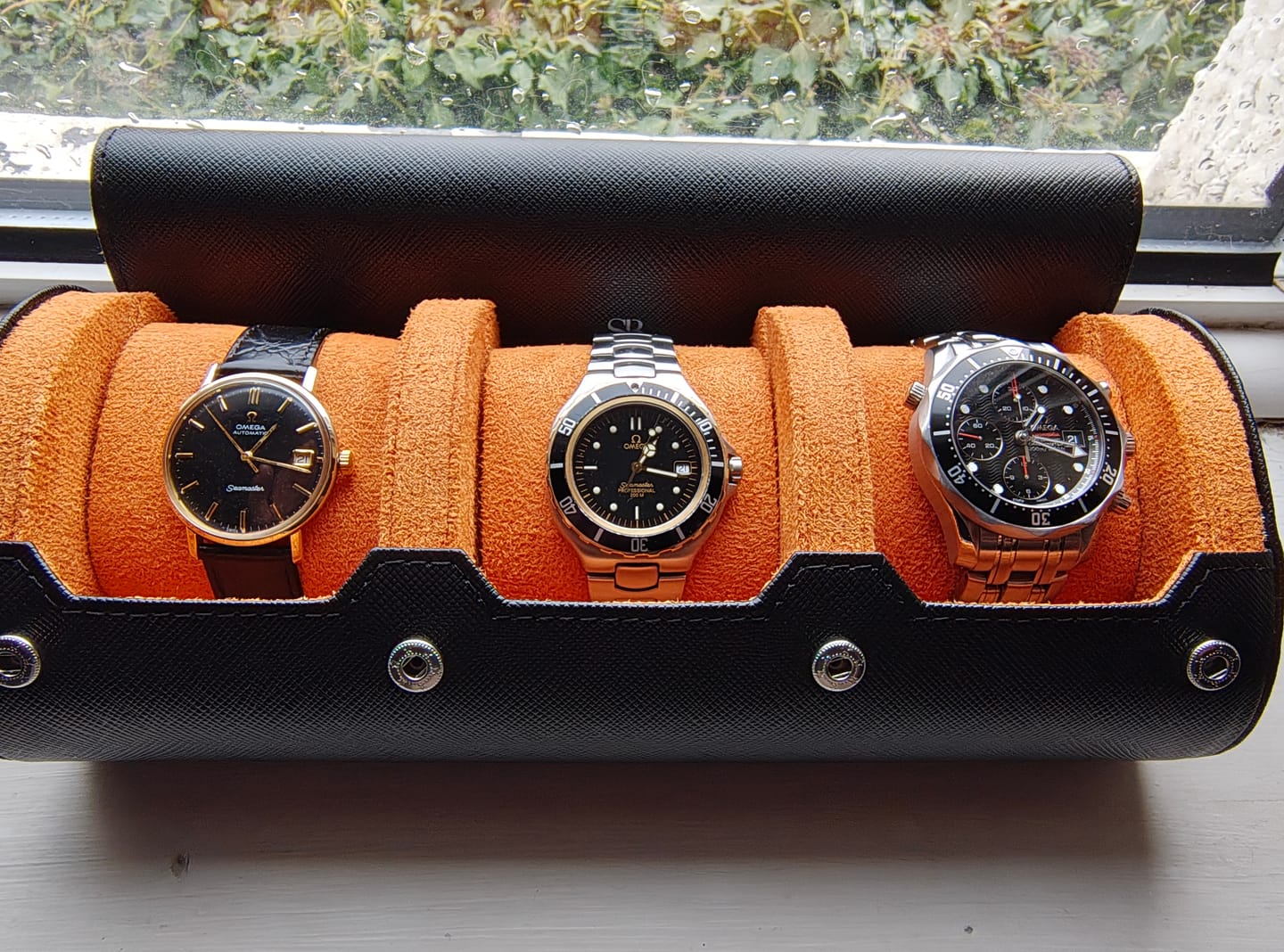 Customer photo review of Olive on Orange watch roll with sliding pillows - 3 watches