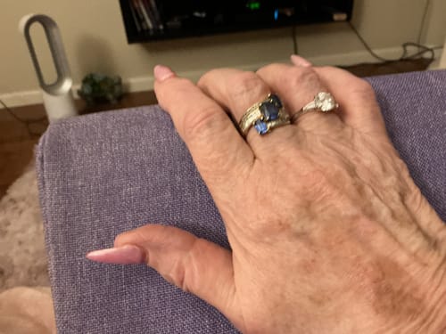 Customer photo review of Three Stone Round Moissanite Tapered Baguette Engagement Ring