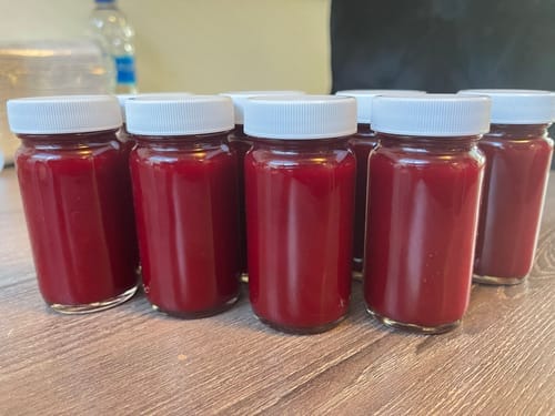 Customer photo review of Glass Juice Shot Bottles Set, White Lids