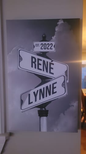 Customer's black and white COUPLES DATE OF LOVE canvas showing street signs with the names René, Lynne, and the year 2022.