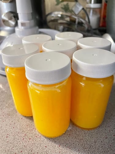 Customer photo review of Glass Juice Shot Bottles Set, White Lids
