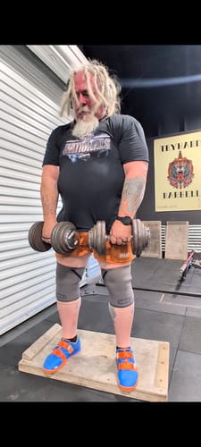 Customer photo review of SQUATTING SHORTS – RETRO / AMBER ORANGE