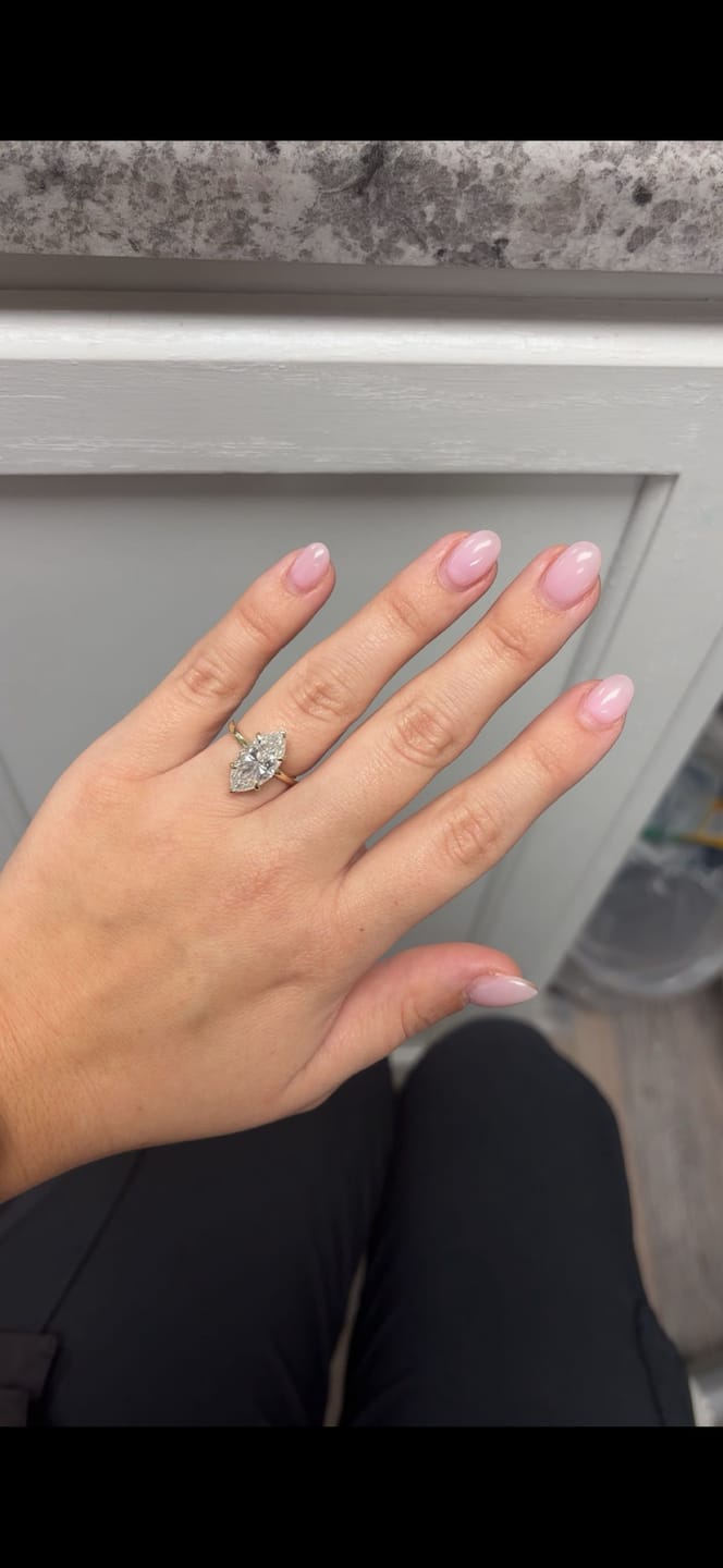 Customer photo review of Verne 3.5 Carat Marquise Cut Low Profile Solitaire Moissanite Diamond Ring in 10k Yellow Gold