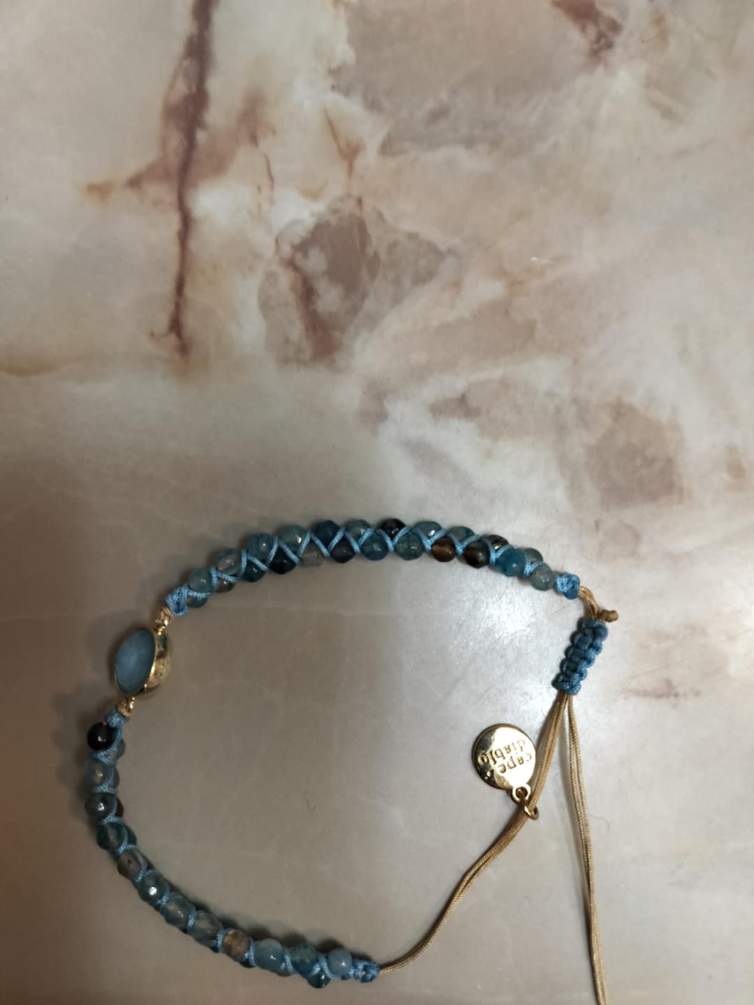 Customer photo review of Aqua Pura Opal Protection Bracelet