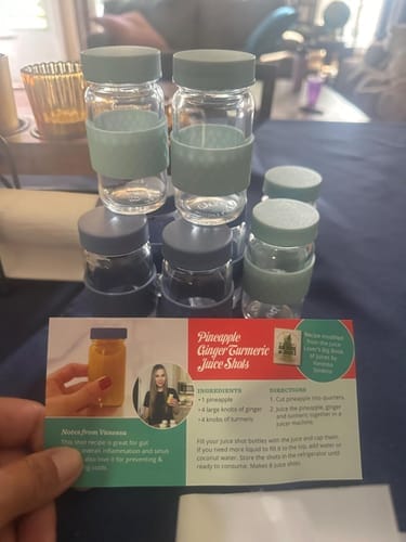 Customer photo review of Glass Juice Shot Bottles Set, Colored Lids & Grip Bands