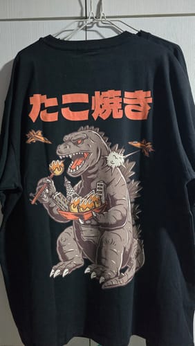 Reviewer's black Snackzilla T-Shirt showing the large graphic print of a monster eating from a bowl on the back.
