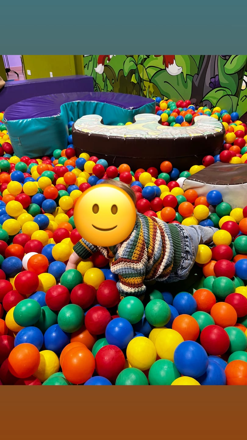 Customer photo review of Rainbow Waffle Snuggly Knitted Jumper