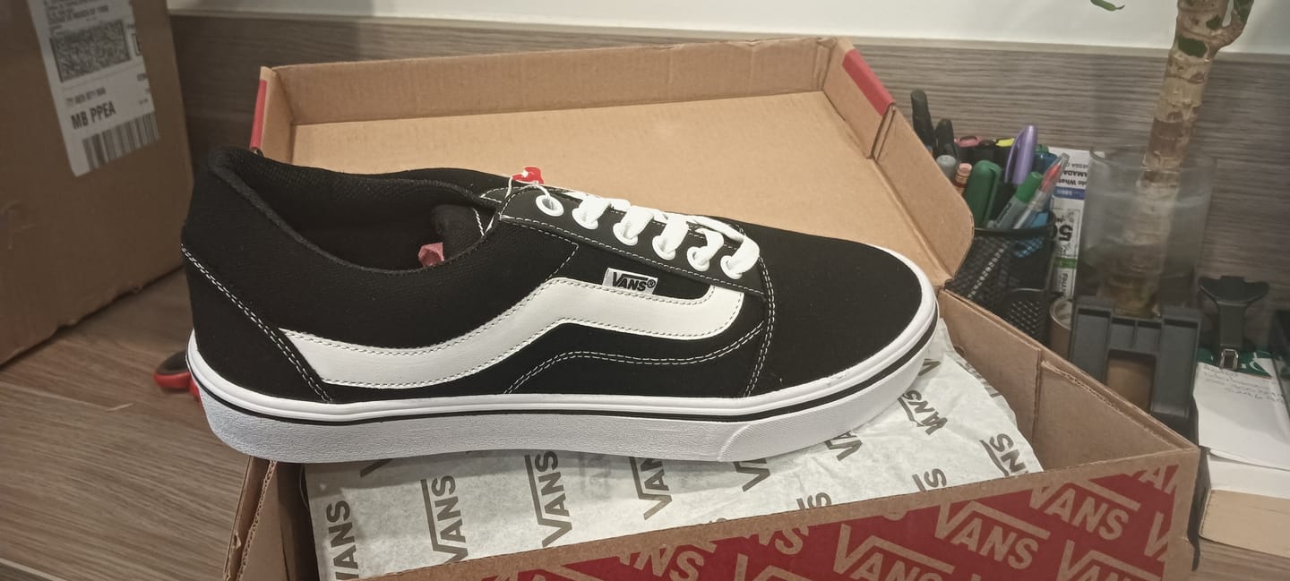 Customer photo review of Tenis 175 Choclo Negro Blanco