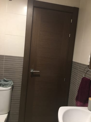 Customer photo review of Manilla de aluminio modelo 559 con roseta cuadrada en acabado negro para puertas