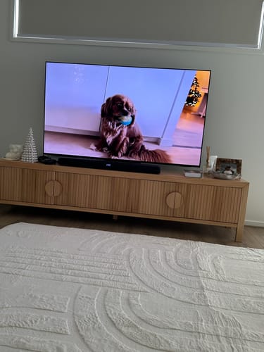 Customer's soft Vanilla Cream Mellow Mat with its 3D carved pattern in a modern living room.