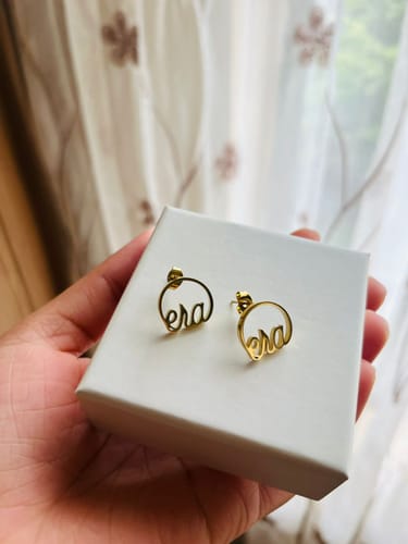 Customer photo review of Gold Era Logo Studs