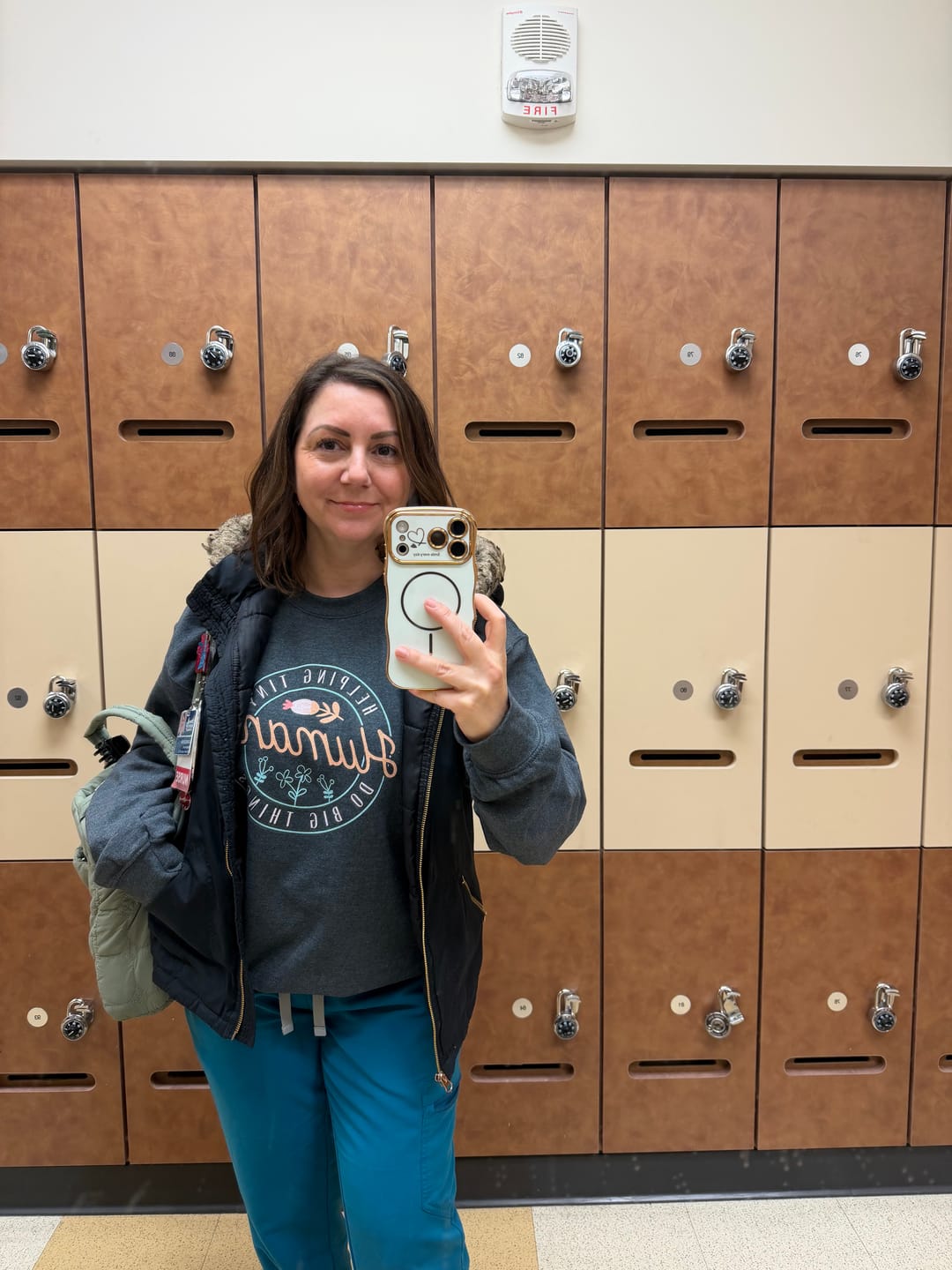 Customer photo review of Helping Tiny Humans Do Big Things Sweatshirt