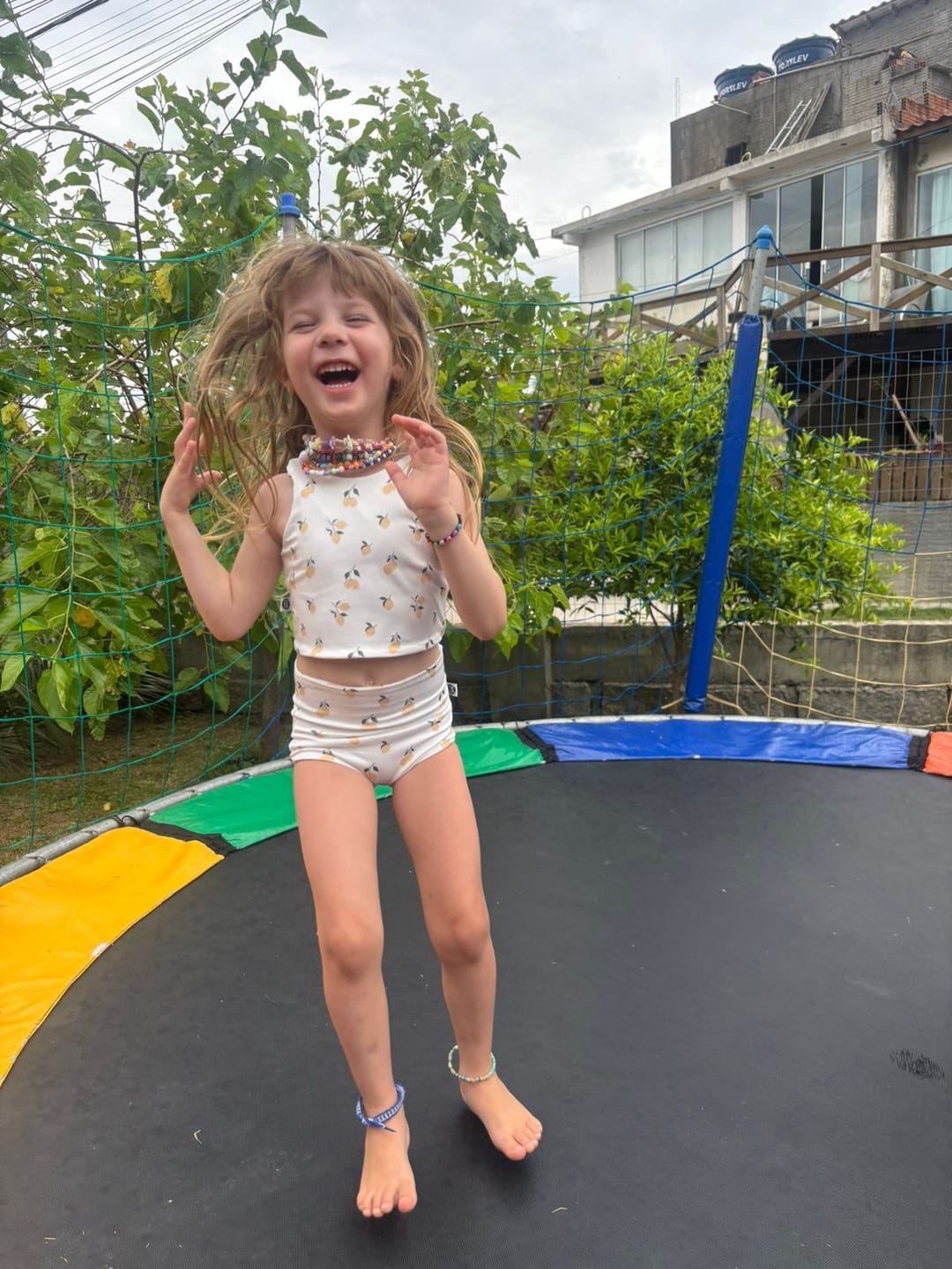 Customer photo review of Biquini Dupla Face Infantil Estampado UV50+ | Limone