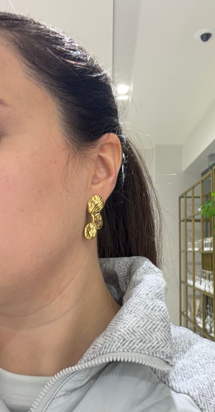 Customer photo review of Par Arete Triple Circulo Irregular