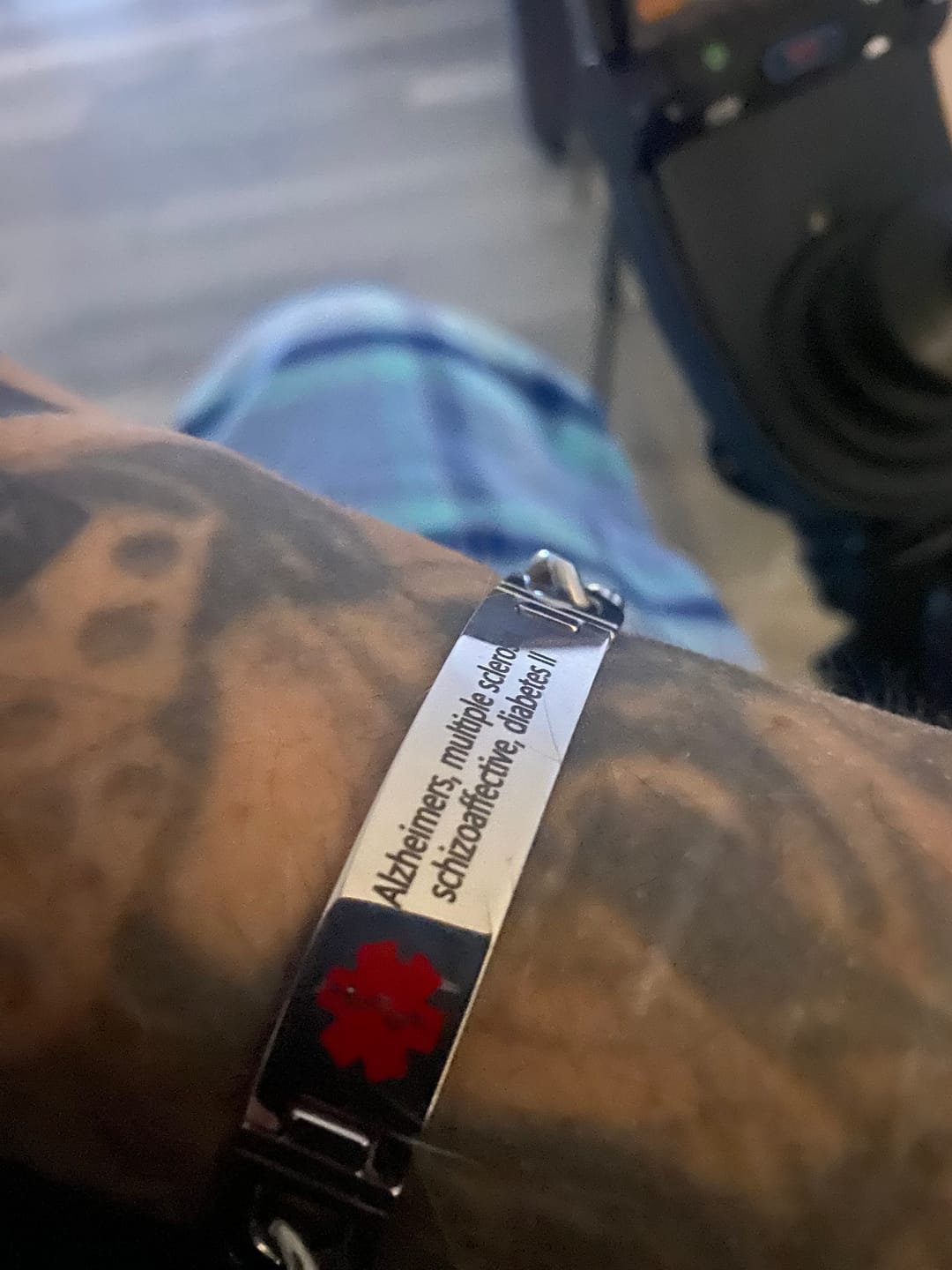 Customer photo review of UniSafe Medical ID Bracelet – Silver with Red Emblem